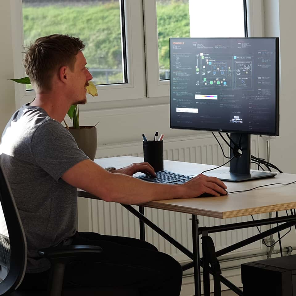 Developer working on interactive application architecture